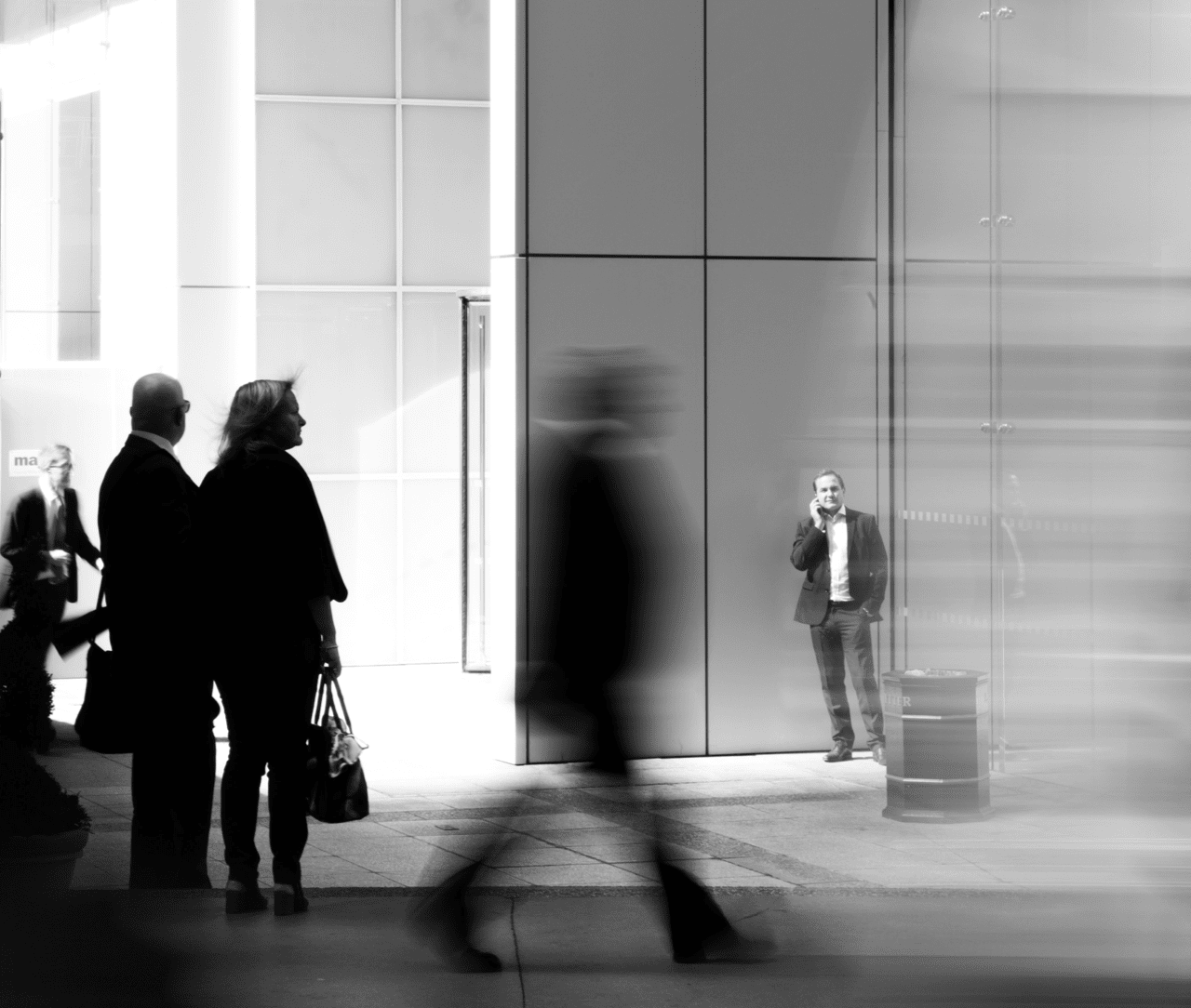 Man Standing and Talking on Cell Phone