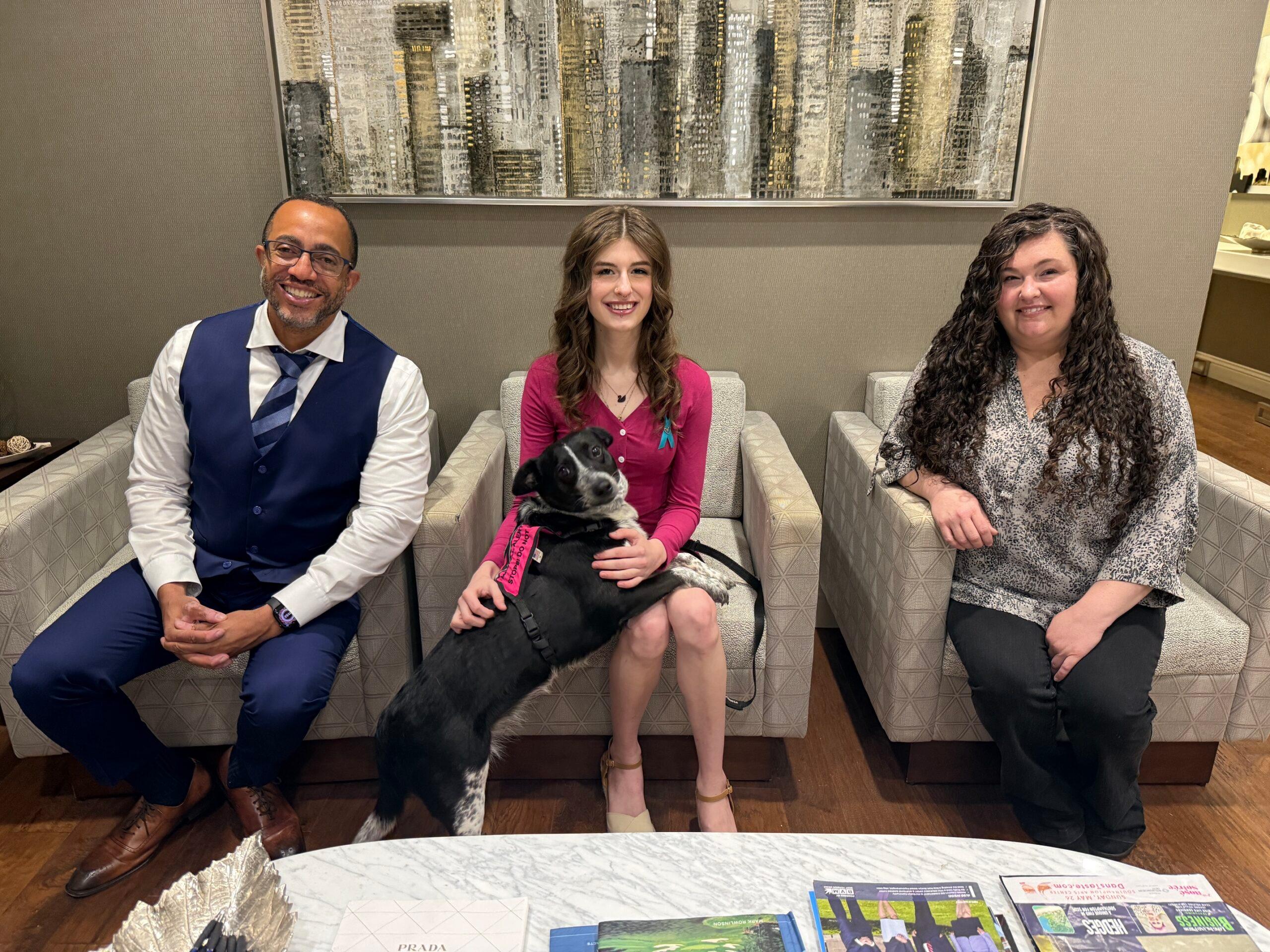 Maggie Abcug, Sonnet, John C. Luke Jr. and Maggie's Mother Following Newsday Interview Disability rights advocate Maggie Abcug with her medical alert dog Sonnet, attorney John C. Luke Jr., and Maggie's mother at Abrams Fensterman following Maggie's Newsday interview.