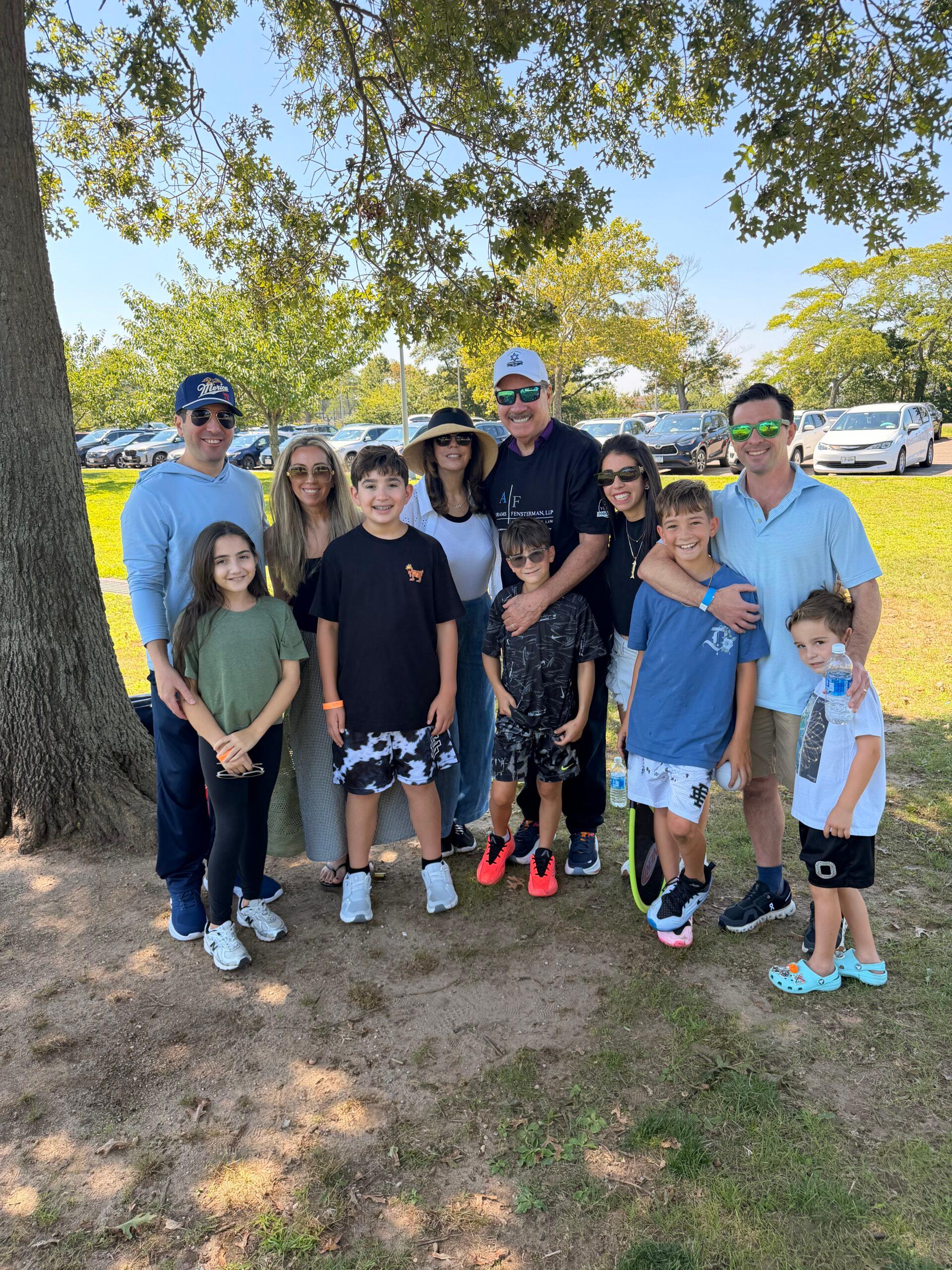 Howard Fensterman with his family at the Abrams Fensterman Annual Family Picnic